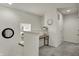 Upstairs hallway with a built-in desk, neutral color scheme and bright natural light at 16057 Coleman Dr, Westfield, IN 46074