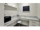 Bright, functional home office with quartz countertops, white cabinets, and natural light at 16057 Coleman Dr, Westfield, IN 46074