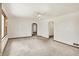 Spacious living room features neutral walls, carpet flooring and natural light at 1901 E Edgewood Ave, Indianapolis, IN 46227