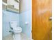 This bathroom has a vintage sink, toilet and medicine cabinet at 2021 E 9Th St, Anderson, IN 46012