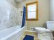 Modern bathroom with white marble tile bathtub at 2021 E 9Th St, Anderson, IN 46012
