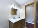 Bathroom featuring a modern vanity with marble countertop and new fixtures at 2021 E 9Th St, Anderson, IN 46012
