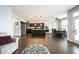 Open kitchen with stainless steel appliances, island with sink, and eat-in dining area at 208 Coatsville Dr, Westfield, IN 46074