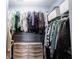 A well-organized walk-in closet with ample storage and a dresser at 208 Coatsville Dr, Westfield, IN 46074