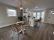 Bright dining room adjacent to a modern kitchen at 220 Huffman Rd, Columbus, IN 47201