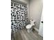 Bathroom featuring a black and white animal shower curtain and updated fixtures at 2284 Horizon Blvd, Greenwood, IN 46143