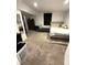 Neutral bedroom featuring carpeted floors, area rug, dresser, and platform bed at 2284 Horizon Blvd, Greenwood, IN 46143