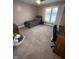 Spacious bedroom featuring neutral carpet, curtains, and a twin bed at 2284 Horizon Blvd, Greenwood, IN 46143