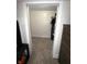 Walk-in closet featuring clothes on racks, carpeted floors, and white walls at 2284 Horizon Blvd, Greenwood, IN 46143