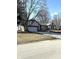 Charming home with a stone and tudor facade, an attached garage and concrete driveway at 2284 Horizon Blvd, Greenwood, IN 46143