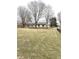 House with large yard and mature trees, creating a serene outdoor ambiance at 2284 Horizon Blvd, Greenwood, IN 46143