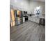 Bright, open kitchen with modern stainless steel appliances, ample cabinets and a picture window at 2284 Horizon Blvd, Greenwood, IN 46143
