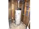 Close-up of the property's water heater and plumbing, indicating its functional setup at 2284 Horizon Blvd, Greenwood, IN 46143