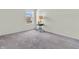 Bright bedroom featuring neutral walls, carpeted floors, and a window with a view at 2311 Lammermoor Ln, Indianapolis, IN 46214