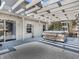 Outdoor deck area with a pergola and a hot tub, perfect for relaxation and entertaining at 2311 Lammermoor Ln, Indianapolis, IN 46214