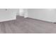 Bright, carpeted living room with natural light at 2311 Lammermoor Ln, Indianapolis, IN 46214