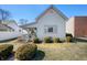 Charming exterior of a home with a covered front porch and manicured shrubbery at 234 S East St, Pendleton, IN 46064