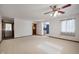 Spacious living room features neutral carpet, and lots of natural light at 234 S East St, Pendleton, IN 46064