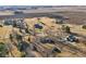 Aerial view features the property's setting among trees, neighbors, and surroundings at 24535 Jerkwater Rd, Sheridan, IN 46069