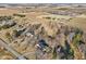 Aerial view showcases multiple homes, barns, fields, mature trees, and private driveways at 24535 Jerkwater Rd, Sheridan, IN 46069