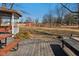 Large backyard featuring a gazebo, a picnic table, and a red barn in the background at 24535 Jerkwater Rd, Sheridan, IN 46069