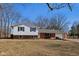 Charming two-story home featuring brick and siding accents, an attached garage, and a well-maintained front yard at 24535 Jerkwater Rd, Sheridan, IN 46069