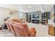 Finished basement with a sectional, exercise equipment, and carpeted floors at 24535 Jerkwater Rd, Sheridan, IN 46069