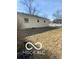 View of the home exterior and the backyard, highlighting outdoor space at 2454 Winfield Ave, Indianapolis, IN 46222
