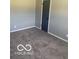 Bedroom with neutral walls, carpeted floor, and a single closet door at 2454 Winfield Ave, Indianapolis, IN 46222