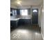 Bright kitchen with updated cabinetry, countertops, and modern fixtures at 2454 Winfield Ave, Indianapolis, IN 46222
