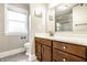 Updated bathroom with modern vanity and granite countertops at 3034 N Pennsylvania St # 1, Indianapolis, IN 46205
