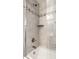 Bathroom featuring a shower and tub with gray tiling and mosaic accent at 3034 N Pennsylvania St # 1, Indianapolis, IN 46205