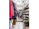 Walk-in closet with shelving and rods for organized storage at 3034 N Pennsylvania St # 1, Indianapolis, IN 46205