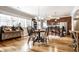 Bright dining area with hardwood floors conveniently located next to the kitchen island and breakfast bar at 3034 N Pennsylvania St # 1, Indianapolis, IN 46205