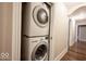 Convenient laundry closet with stacked washer and dryer units at 3034 N Pennsylvania St # 1, Indianapolis, IN 46205