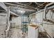 Unfinished basement with exposed pipes and wires, ready to be renovated to your liking at 3103 S Lockburn St, Indianapolis, IN 46221