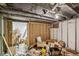 Unfinished basement with exposed beams and block walls at 3103 S Lockburn St, Indianapolis, IN 46221