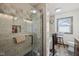 Bathroom featuring a tiled shower stall with glass door at 3103 S Lockburn St, Indianapolis, IN 46221