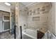 Bathroom featuring a tiled shower and bath tub at 3103 S Lockburn St, Indianapolis, IN 46221
