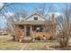 Charming brick home with a cozy front porch, perfect for relaxing outdoors at 3103 S Lockburn St, Indianapolis, IN 46221