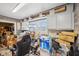 Cluttered bonus room with built in cabinets and lots of light at 3103 S Lockburn St, Indianapolis, IN 46221