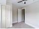 Bedroom with open door, closet, and carpet at 3419 Carrollton Ave, Indianapolis, IN 46205