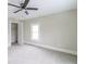 Inviting bedroom featuring a closet and a bright window for ample sunlight at 3419 Carrollton Ave, Indianapolis, IN 46205