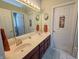 Bright and open bathroom features double vanities and tiled floors at 3681 S Station Dr, Columbus, IN 47203