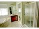 A well-lit bathroom features a shower and a tub at 3681 S Station Dr, Columbus, IN 47203