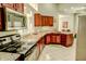 Well-lit kitchen featuring stainless steel appliances and ample counter space at 3681 S Station Dr, Columbus, IN 47203