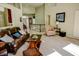 Bright living room with carpet, leather furniture and open floor plan at 3681 S Station Dr, Columbus, IN 47203