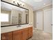 Spacious bathroom featuring a large vanity, a soaking tub, and a tiled stand up shower at 3841 Falls Cir, Carmel, IN 46033