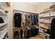 Organized walk-in closet with shelving and hanging space for efficient storage at 3841 Falls Cir, Carmel, IN 46033