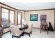 Dining area featuring a table with four chairs, lots of natural light, and a pinball machine at 3841 Falls Cir, Carmel, IN 46033